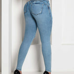 Slim-fit destroyed jeans met hoge taille